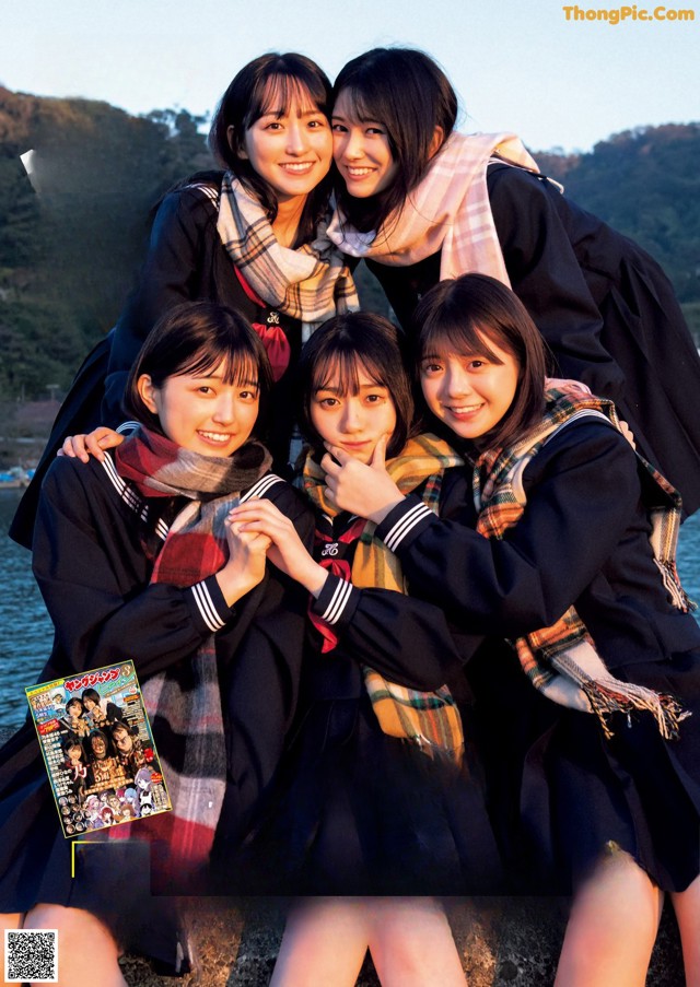 A group of young women posing for a magazine cover.