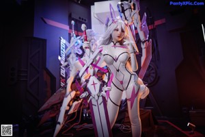 A woman in a white and purple outfit holding a sword.