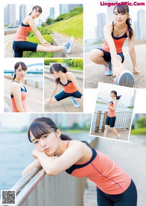 A woman in a pink top and black shorts posing for a picture.
